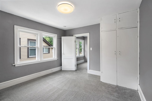 1067 Van Buren Ave, Saint Paul, MN 55104 - unfurnished bedroom featuring carpet floors and a closet