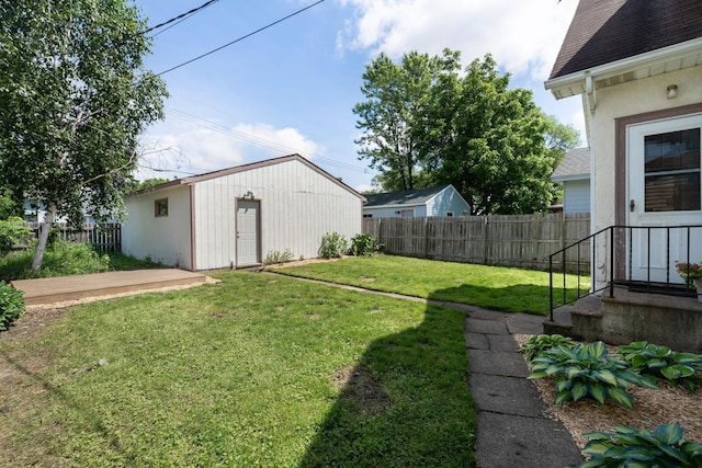 1067 Van Buren Ave, Saint Paul, MN 55104 - view of yard featuring an outbuilding