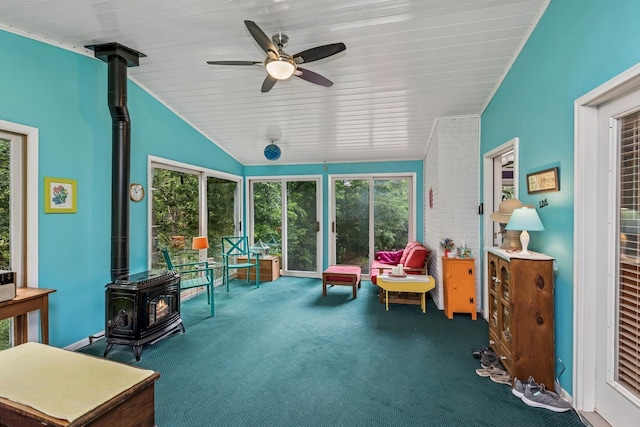 4837 Diane Dr, Minnetonka, MN 55343 - sunroom featuring a wood stove, carpet, lofted ceiling, healthy amount of natural light, and wooden ceiling