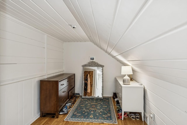 4837 Diane Dr, Minnetonka, MN 55343 - interior space featuring light wood finished floors, vaulted ceiling, and a decorative wall