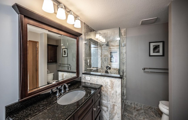 452 Spruce St, Shakopee, MN 55379 - full bath featuring tiled shower, vanity, and a textured ceiling