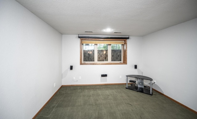 452 Spruce St, Shakopee, MN 55379 - carpeted spare room with baseboards and a textured ceiling