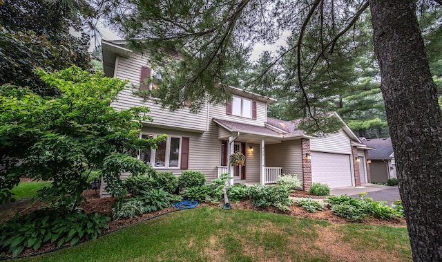 452 Spruce St, Shakopee, MN 55379 - view of front of home featuring an attached garage, a front yard, and driveway