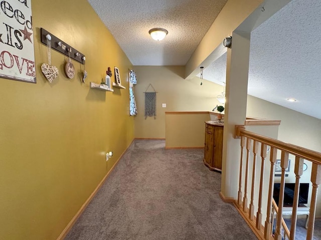 110 Glenshire Blvd S, Watkins, MN 55389 - hallway with a textured ceiling, carpet floors, and an upstairs landing