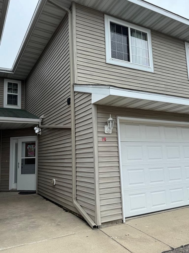 110 Glenshire Blvd S, Watkins, MN 55389 - view of home's exterior featuring an attached garage