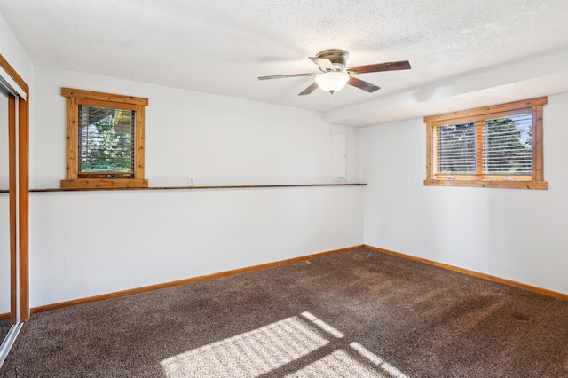 733 Meadow Dr, Hudson, WI 54016 - unfurnished room featuring carpet, healthy amount of natural light, a ceiling fan, and a textured ceiling