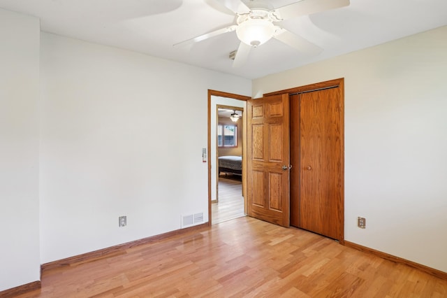 733 Meadow Dr, Hudson, WI 54016 - unfurnished room with light wood-type flooring and a ceiling fan