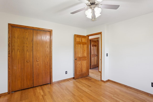 733 Meadow Dr, Hudson, WI 54016 - unfurnished bedroom with light wood-type flooring, a closet, and ceiling fan