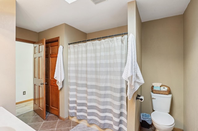 733 Meadow Dr, Hudson, WI 54016 - full bathroom featuring curtained shower and tile patterned flooring