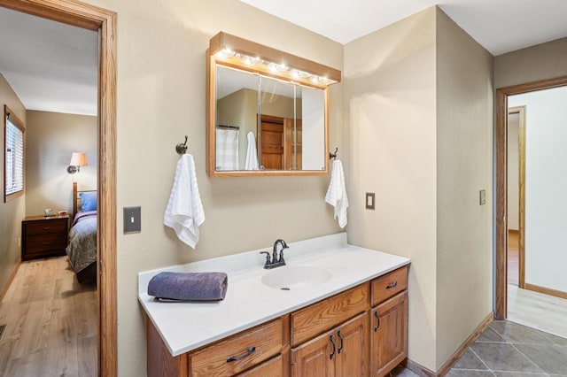 733 Meadow Dr, Hudson, WI 54016 - full bathroom featuring vanity and ensuite bathroom
