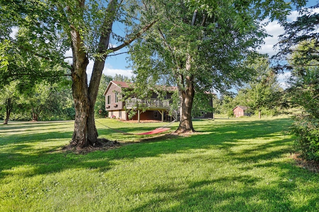 733 Meadow Dr, Hudson, WI 54016 - view of grassy yard featuring a wooden deck