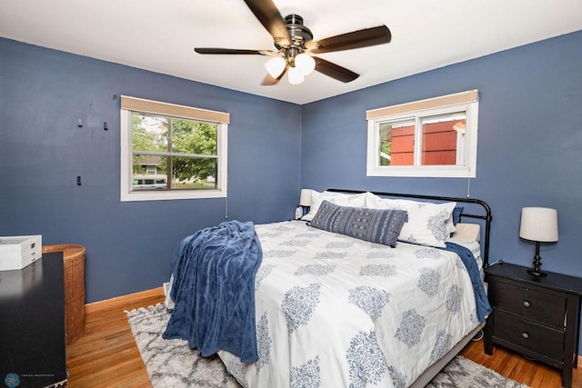 1124 15th St N, Moorhead, MN 56560 - bedroom featuring wood finished floors and a ceiling fan