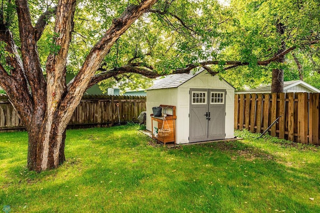 1124 15th St N, Moorhead, MN 56560 - view of shed with a fenced backyard