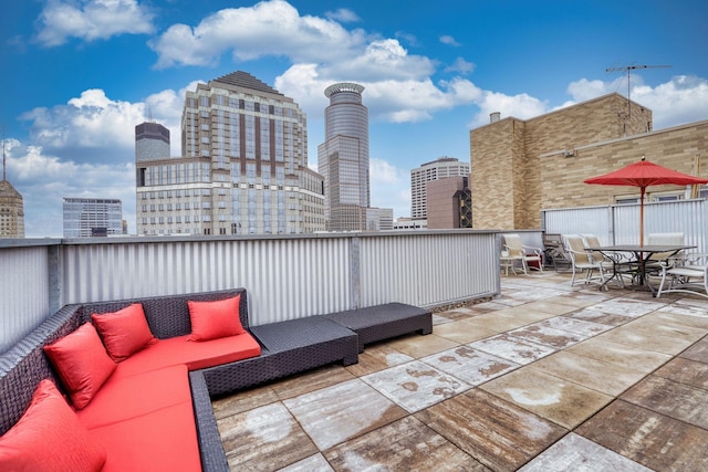 431 7th St Unit 2605, Minneapolis, MN 55415 - deck featuring a skyline view, outdoor lounge area, a patio, and outdoor dining space