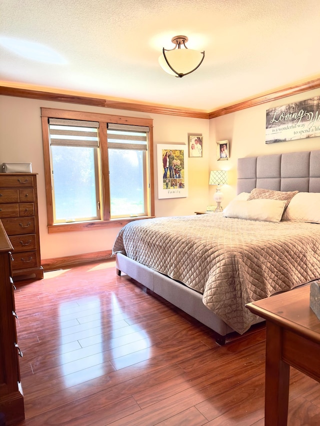 650 Shardlow Pl NE, Byron, MN 55920 - bedroom with ornamental molding and wood finished floors