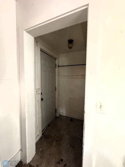 310 1st St SW, Mahnomen, MN 56557 - corridor featuring concrete flooring