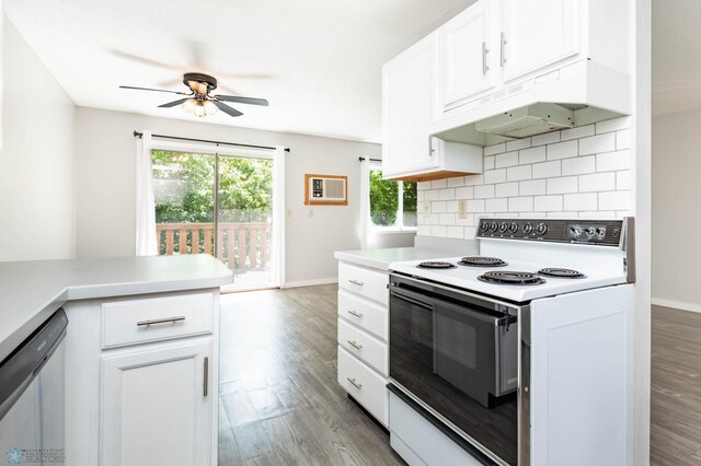 3050 18th St S, Fargo, ND 58103 - kitchen with white electric range, under cabinet range hood, stainless steel dishwasher, ceiling fan, and wood finished floors