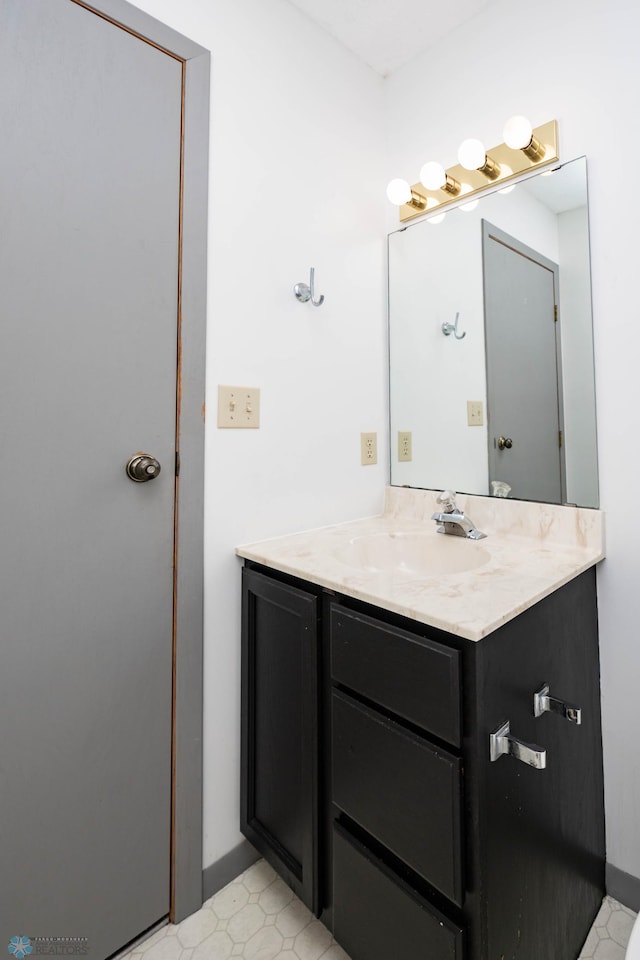 3050 18th St S, Fargo, ND 58103 - bathroom featuring vanity and tile patterned floors