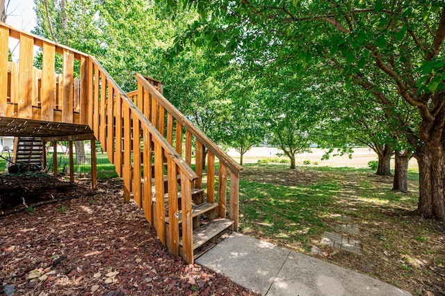 3050 18th St S, Fargo, ND 58103 - view of yard featuring stairway and a wooden deck