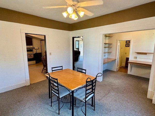 720 Fir Ave, Bird Island, MN 55310 - dining room featuring carpet floors and ceiling fan