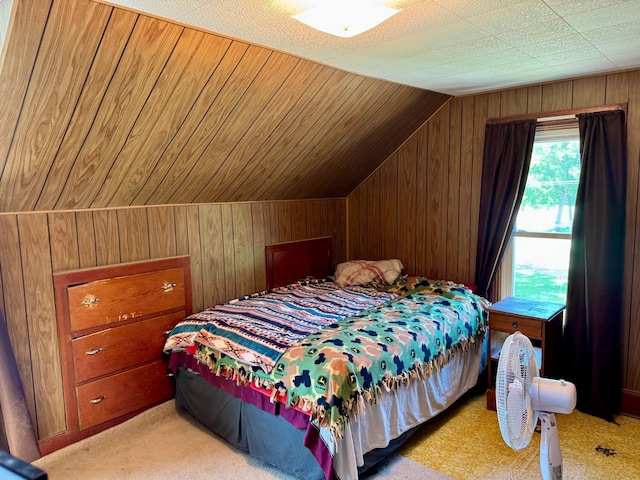 720 Fir Ave, Bird Island, MN 55310 - bedroom featuring wooden walls, lofted ceiling, and light carpet
