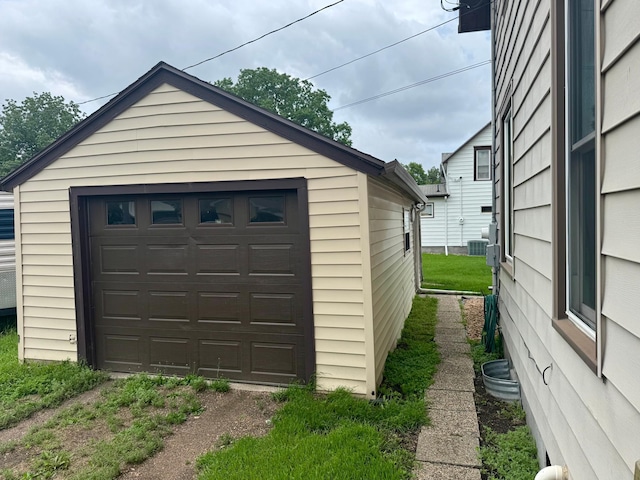 720 Fir Ave, Bird Island, MN 55310 - detached garage featuring driveway
