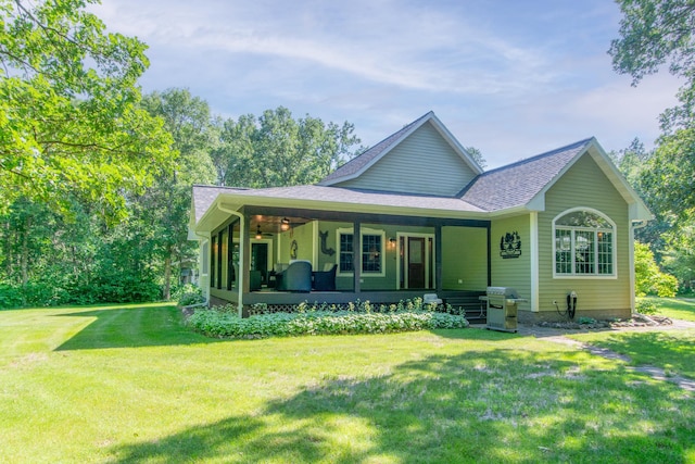 1069 134th St SW, Sylvan Twp, MN 56473 - view of front of home with a front lawn, covered porch, and a shingled roof