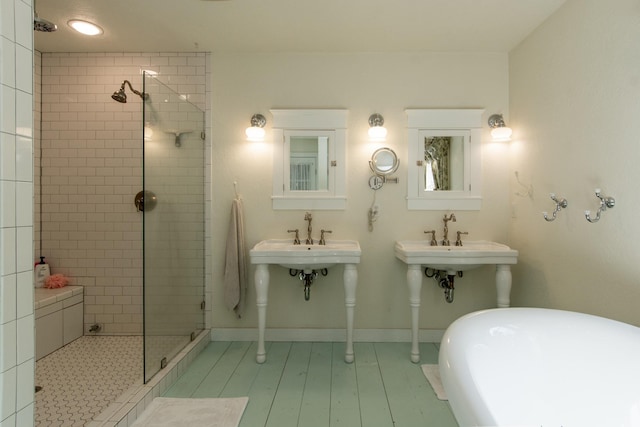 1069 134th St SW, Sylvan Twp, MN 56473 - bathroom with tiled shower and baseboards