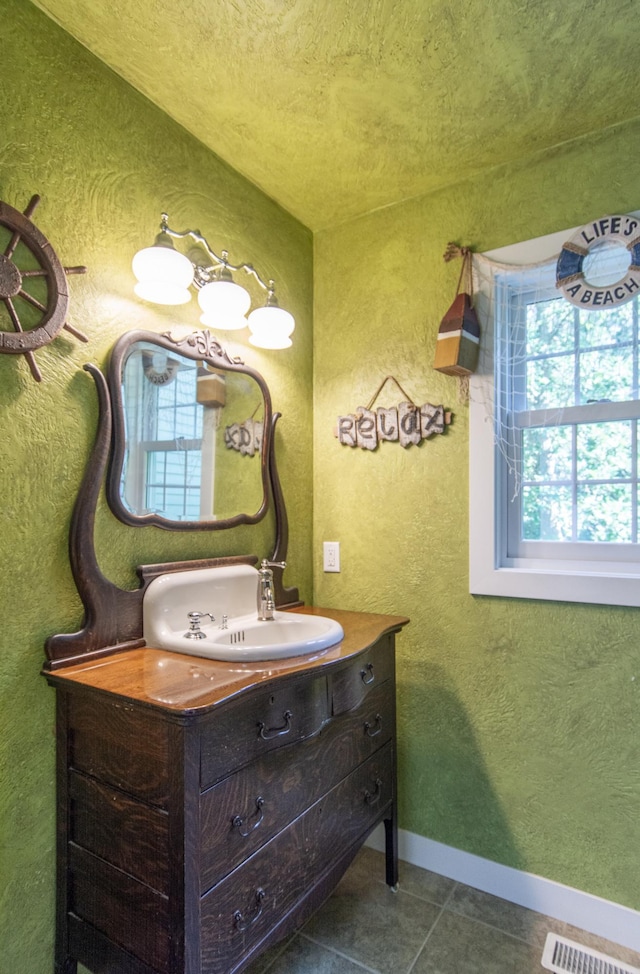 1069 134th St SW, Sylvan Twp, MN 56473 - bathroom featuring vanity and tile patterned floors