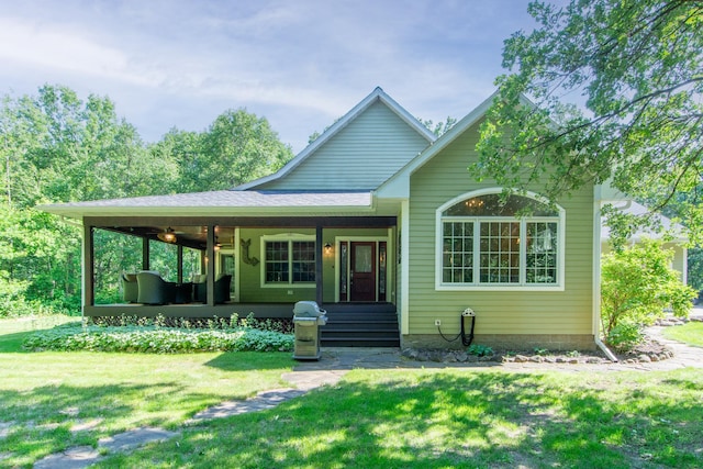 1069 134th St SW, Sylvan Twp, MN 56473 - view of front of property featuring a front yard, a ceiling fan, and a porch
