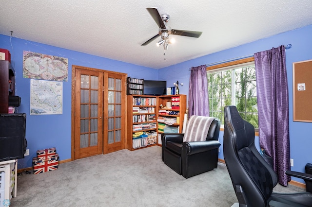 106 12th St NE, Barnesville, MN 56514 - home office with a ceiling fan, a textured ceiling, carpet flooring, and french doors
