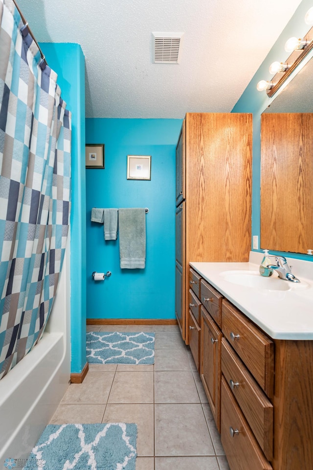 106 12th St NE, Barnesville, MN 56514 - full bath featuring vanity, tile patterned floors, and shower / bath combination with curtain
