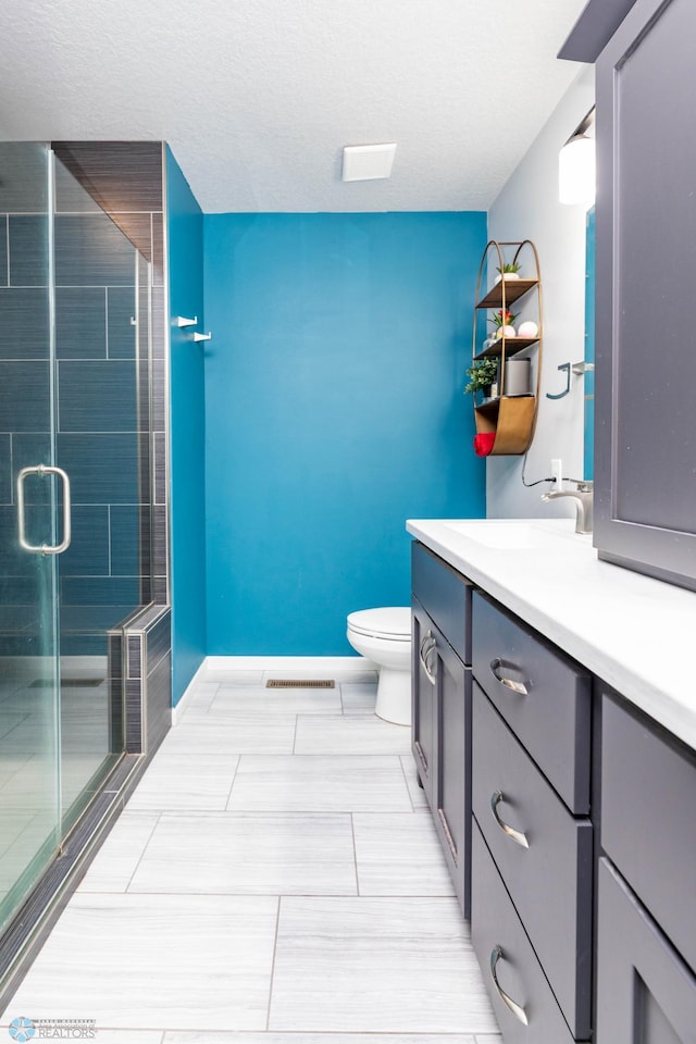 4701 11th St W, West Fargo, ND 58078 - full bath featuring vanity, a shower stall, and tile patterned flooring