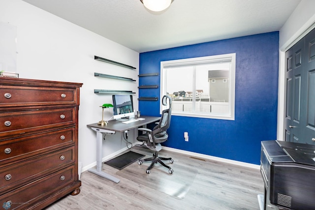 4701 11th St W, West Fargo, ND 58078 - home office with light wood-type flooring and baseboards