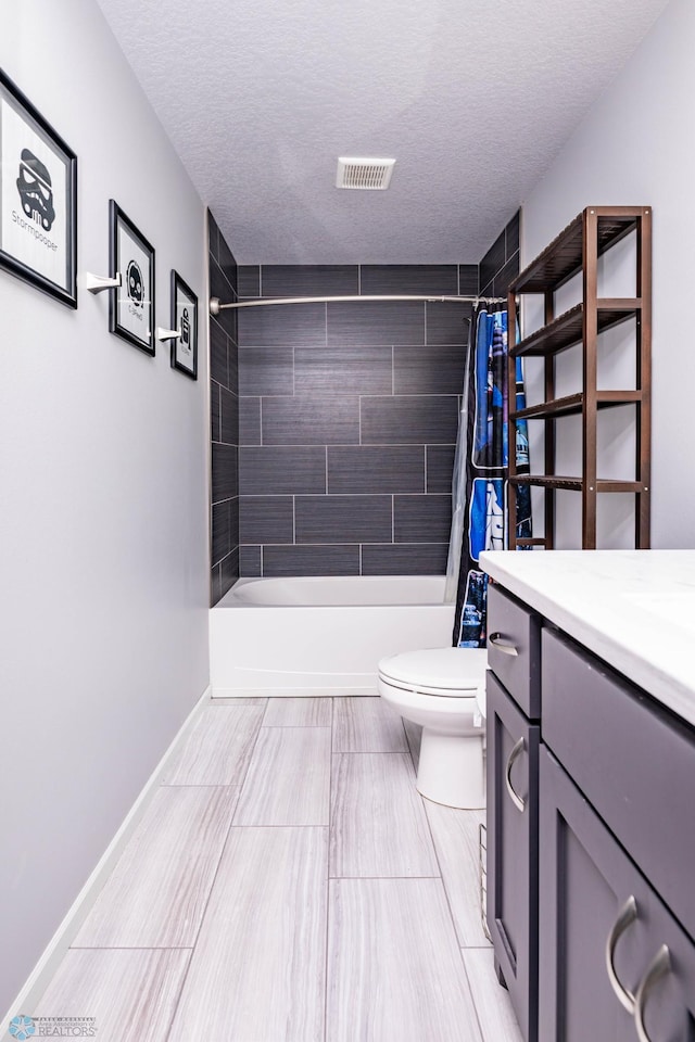 4701 11th St W, West Fargo, ND 58078 - full bath with vanity, shower / bath combo with shower curtain, and a textured ceiling