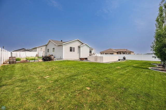 4701 11th St W, West Fargo, ND 58078 - rear view of house featuring a fenced backyard