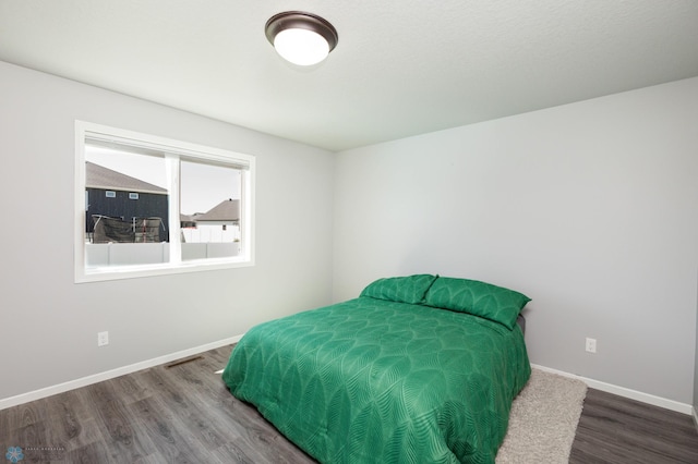 4701 11th St W, West Fargo, ND 58078 - bedroom with wood finished floors and baseboards
