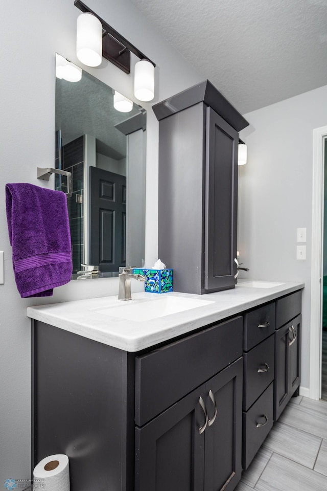 4701 11th St W, West Fargo, ND 58078 - full bathroom with double vanity and a shower with door