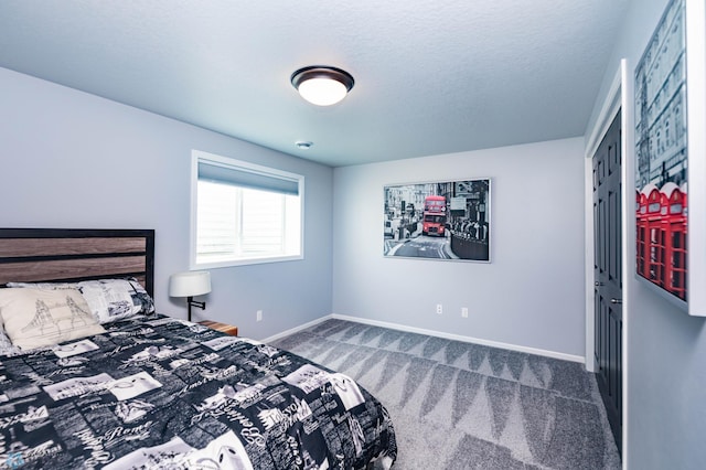 4701 11th St W, West Fargo, ND 58078 - bedroom with carpet flooring and baseboards