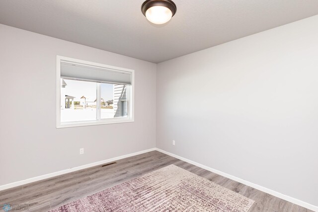 4701 11th St W, West Fargo, ND 58078 - empty room with wood finished floors