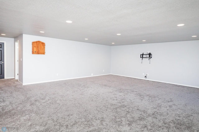 4701 11th St W, West Fargo, ND 58078 - carpeted spare room with recessed lighting and a textured ceiling
