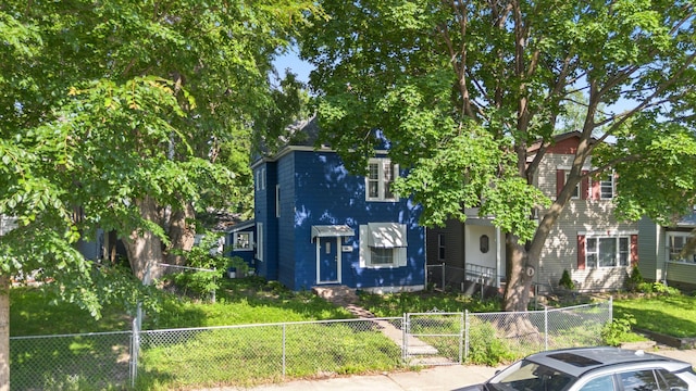3114 Russell Ave N, Minneapolis, MN 55411 - view of front of property featuring a fenced front yard and a gate