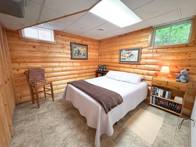 34002 Fiske View Dr, Underwood, MN 56586 - bedroom with a paneled ceiling and log walls
