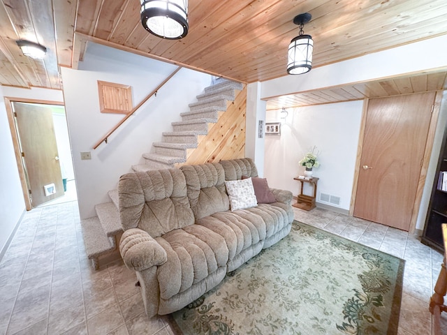 34002 Fiske View Dr, Underwood, MN 56586 - living area featuring wood ceiling, stairs, and light tile patterned floors