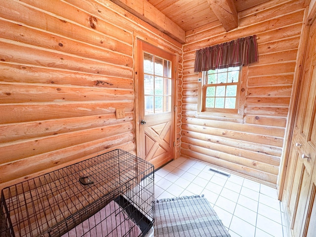 34002 Fiske View Dr, Underwood, MN 56586 - doorway to outside featuring rustic walls, tile patterned floors, and wooden ceiling