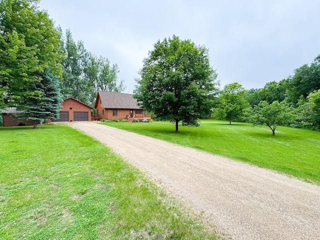 34002 Fiske View Dr, Underwood, MN 56586 - view of front facade featuring an outdoor structure, a front lawn, and driveway
