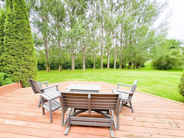 34002 Fiske View Dr, Underwood, MN 56586 - wooden deck with a yard and view of wooded area