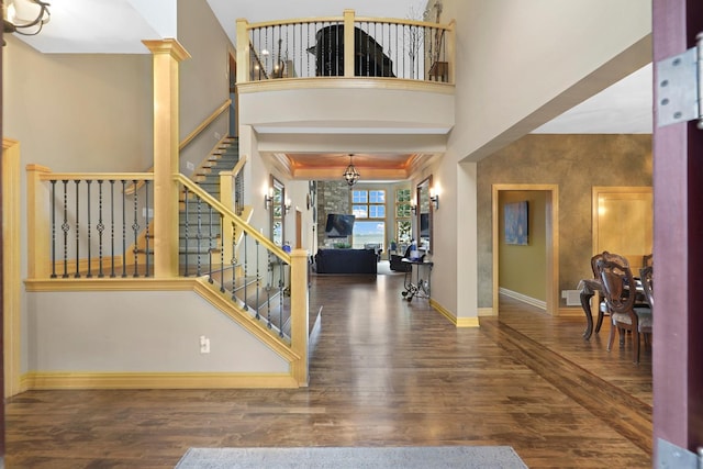 22620 Hayward Ave N, Forest Lake, MN 55025 - entrance foyer featuring a chandelier, wood finished floors, stairway, and a high ceiling