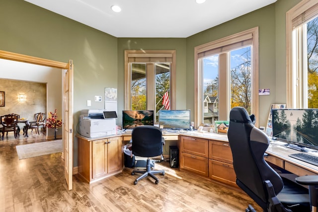 22620 Hayward Ave N, Forest Lake, MN 55025 - home office with light wood-style flooring, recessed lighting, and built in desk