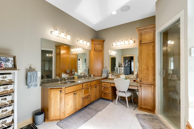 22620 Hayward Ave N, Forest Lake, MN 55025 - bathroom with double vanity, tile patterned floors, and an enclosed shower